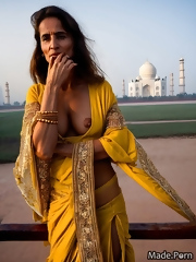 Arab mature 60+ in a dress wants sex with a guy