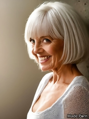 Sweet granny smiles in anticipation of a good orgasm